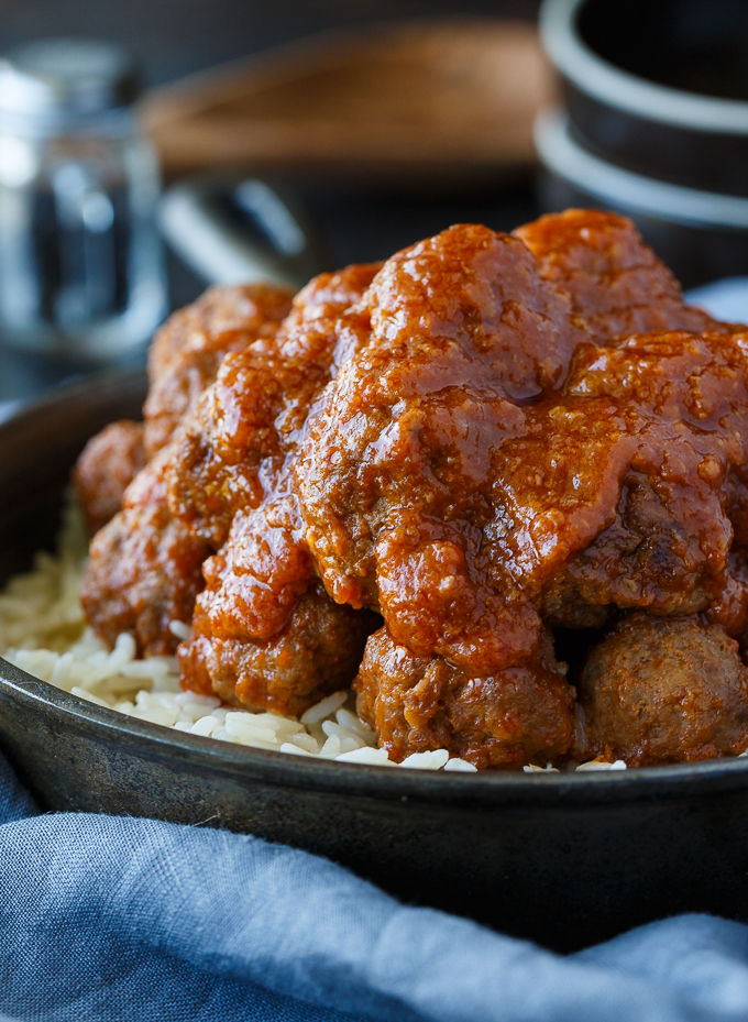 Tangy Sweet and Sour Meatballs - These delicious and freezer-friendly meatballs are simmered in a mouthwatering sauce for the easiest recipe ever! Serve over rice or on toothpicks for a tantalizing appetizer.