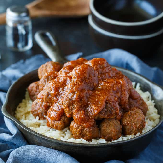 Tangy Sweet and Sour Meatballs - These delicious and freezer-friendly meatballs are simmered in a mouthwatering sauce for the easiest recipe ever! Serve over rice or on toothpicks for a tantalizing appetizer.