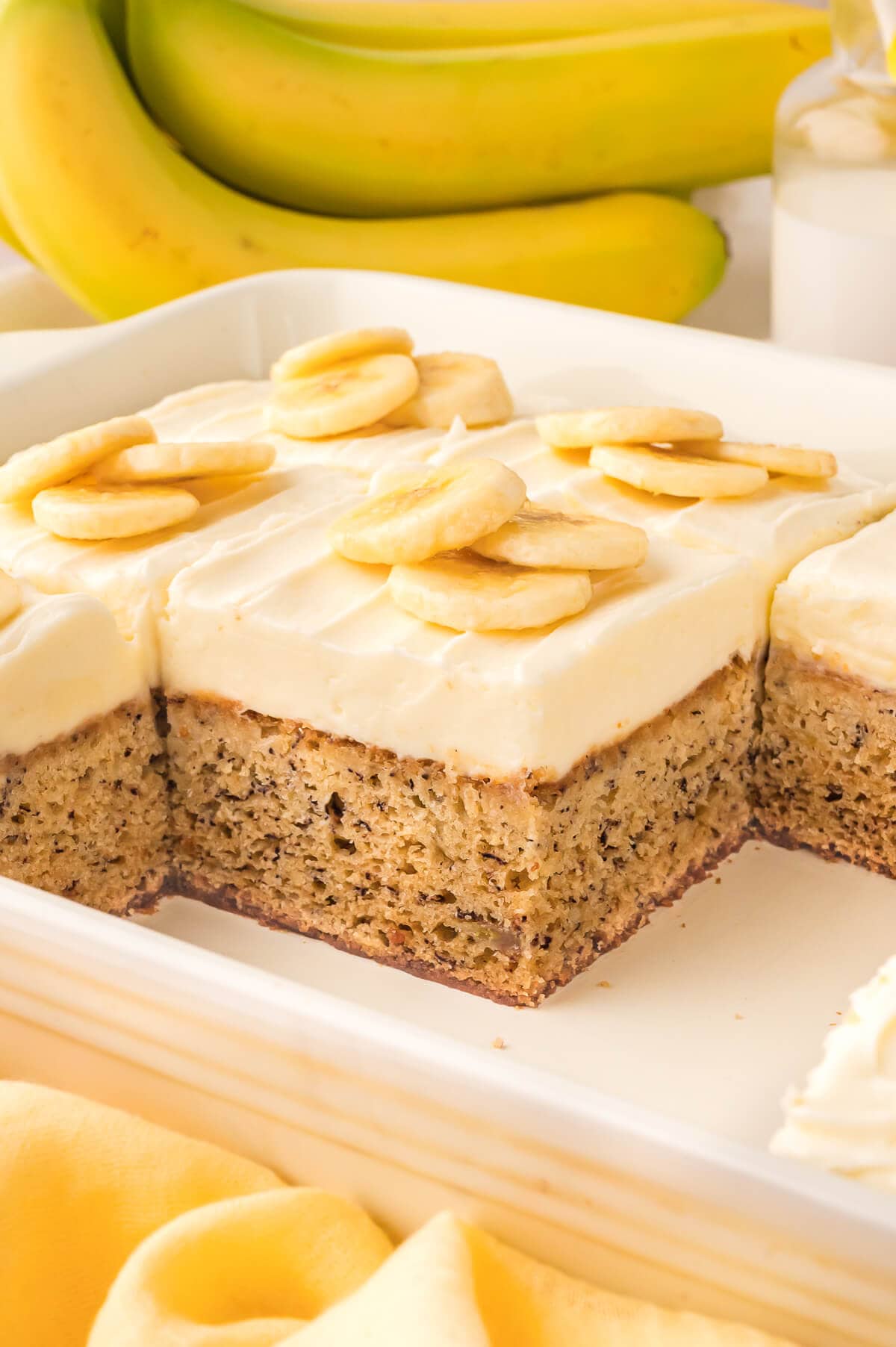 The cake cut into slices in a pan.