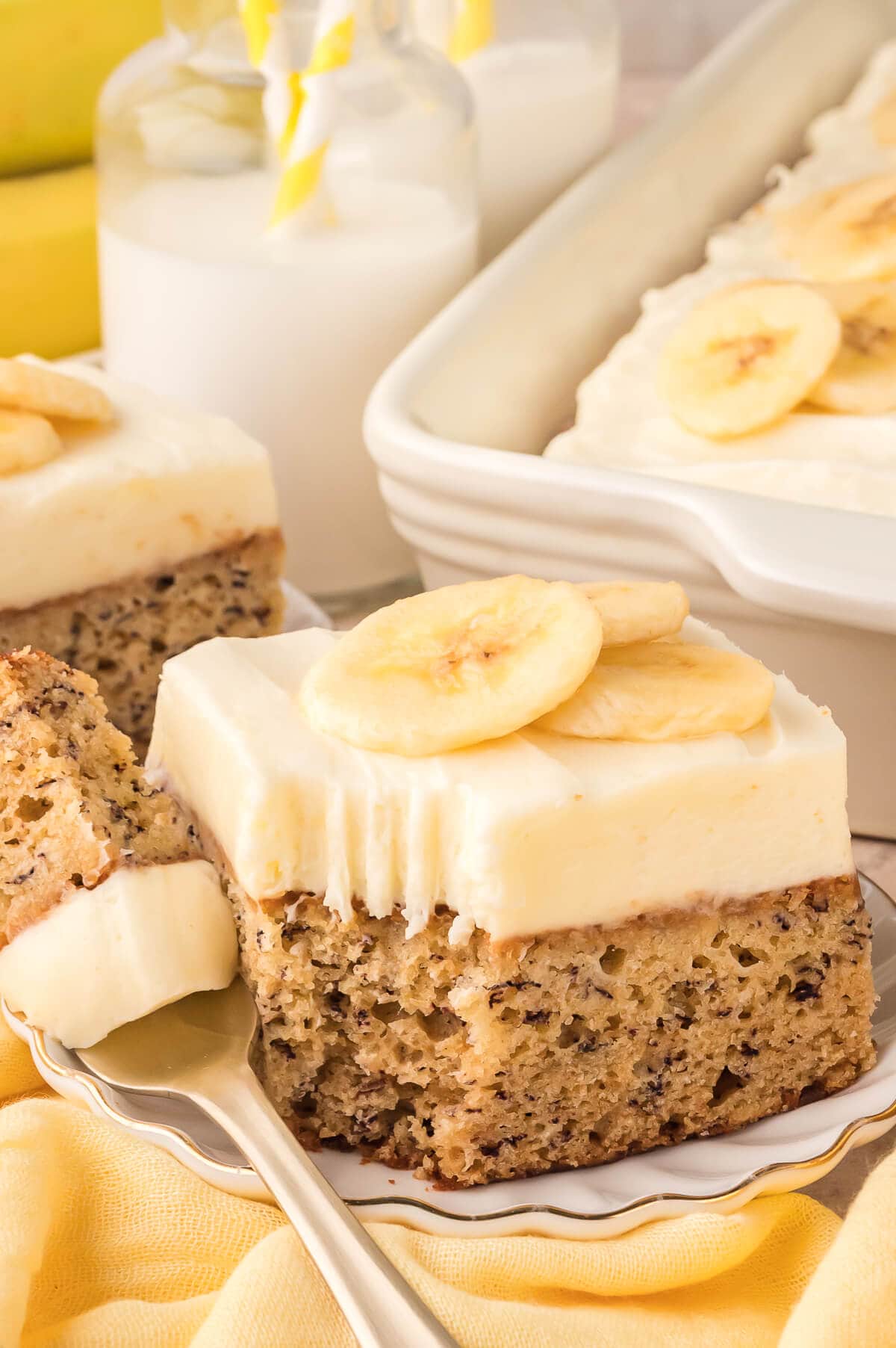 A slice of cake with a bite out of it.