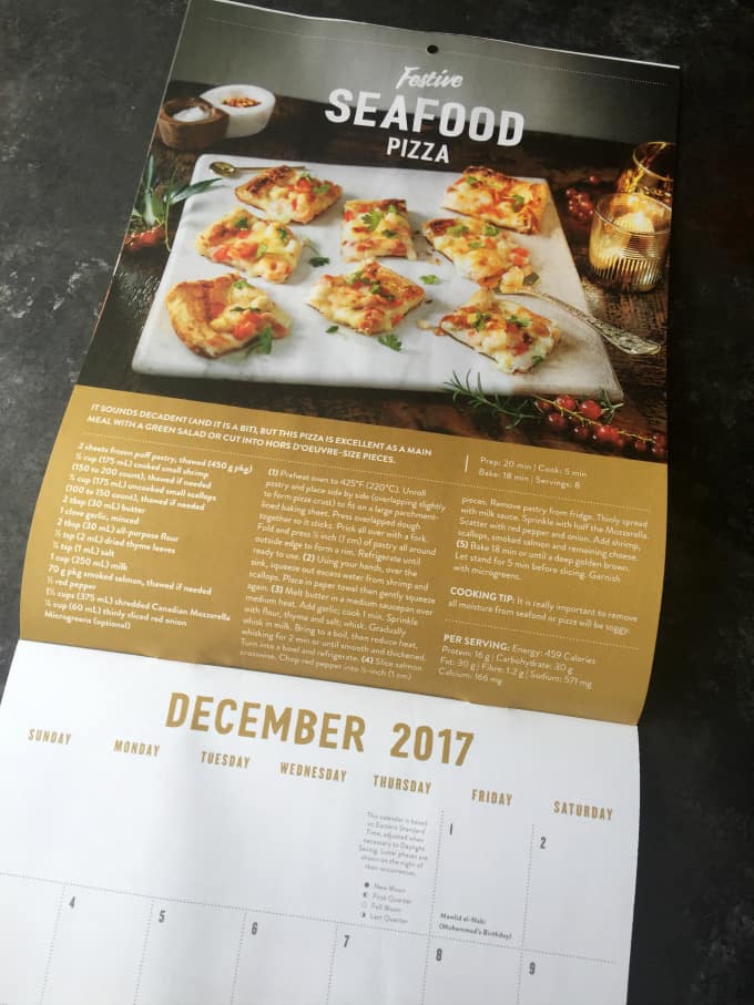 Festive Seafood Pizza – Serve this easy recipe as a holiday appetizer or as a main course paired with a green salad. Look for it in the 2018 #MilkCalendar from the Dairy Farmers of Canada #ad 