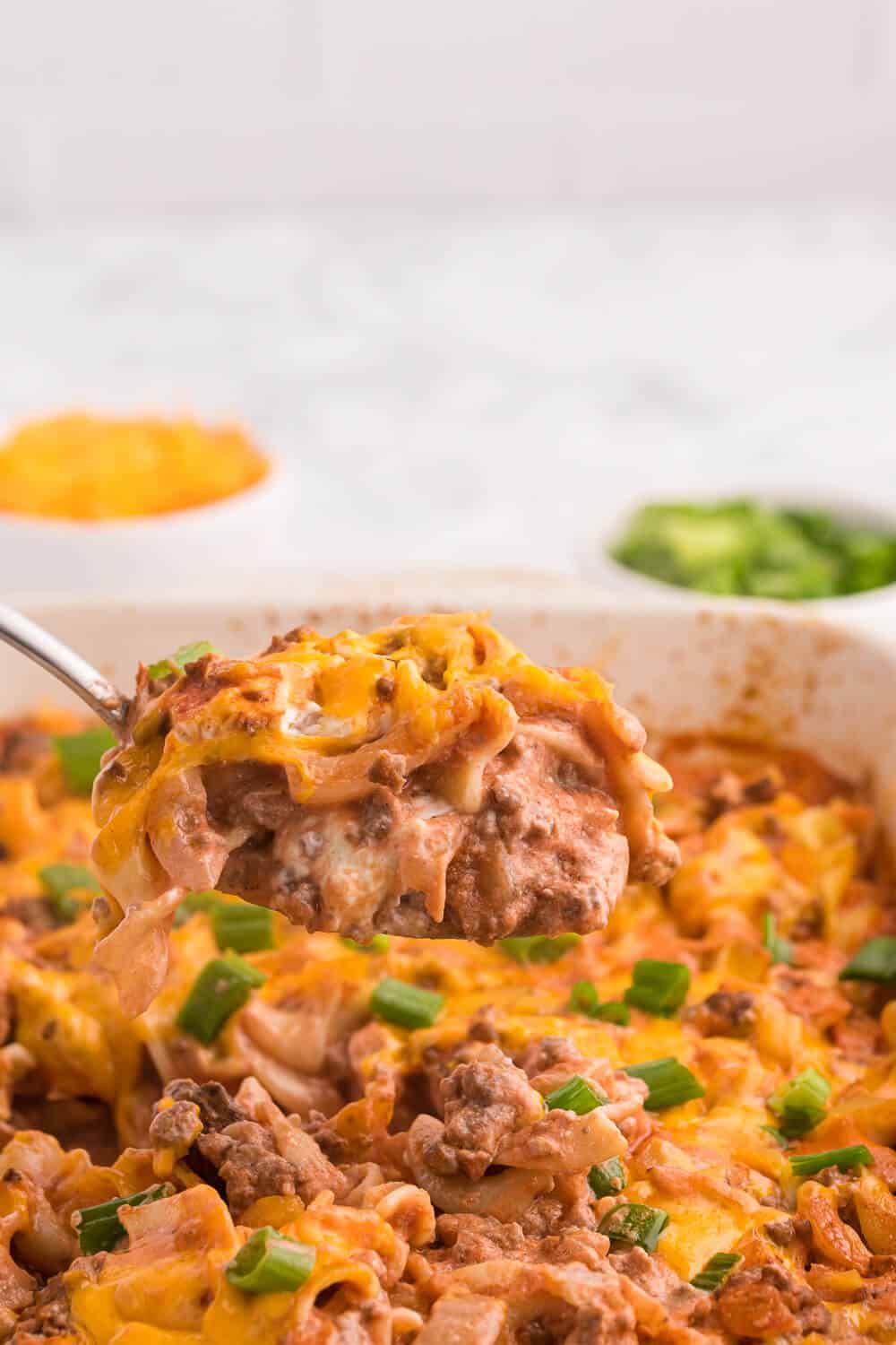 Beef Noodle Bake - This beefy pasta casserole, with crowd pleasing flavours of cheese, garlic and sour cream, is the perfect make-ahead dish for feeding a large group.