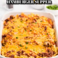 cheesy hamburger supper in a white casserole pan