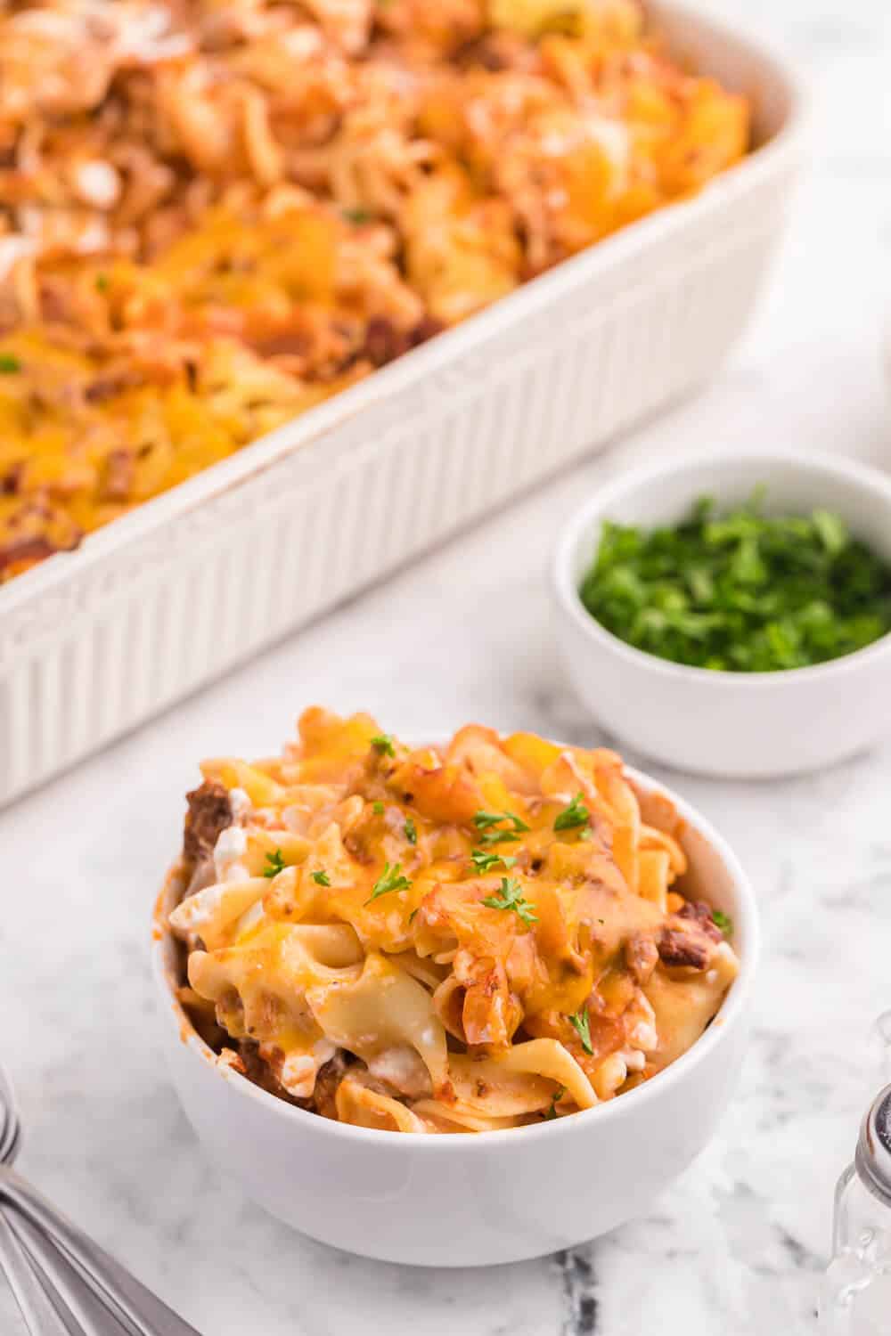 Cheesy Hamburger Supper - This casserole might remind you of a lasagna. It has the same cheesy tomato flavours, but the addition of cream cheese makes it even better!