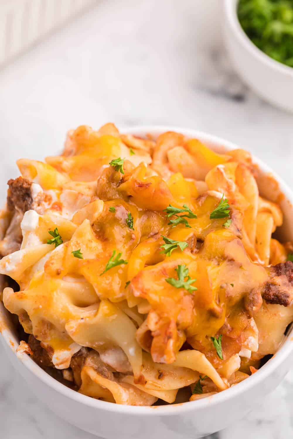 Cheesy Hamburger Supper - This casserole might remind you of a lasagna. It has the same cheesy tomato flavours, but the addition of cream cheese makes it even better!