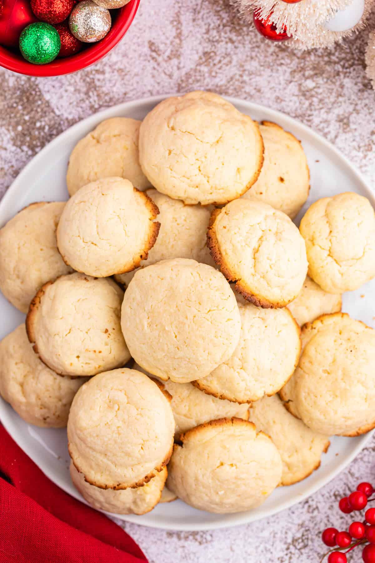 Cream cheese cookies on a plate.