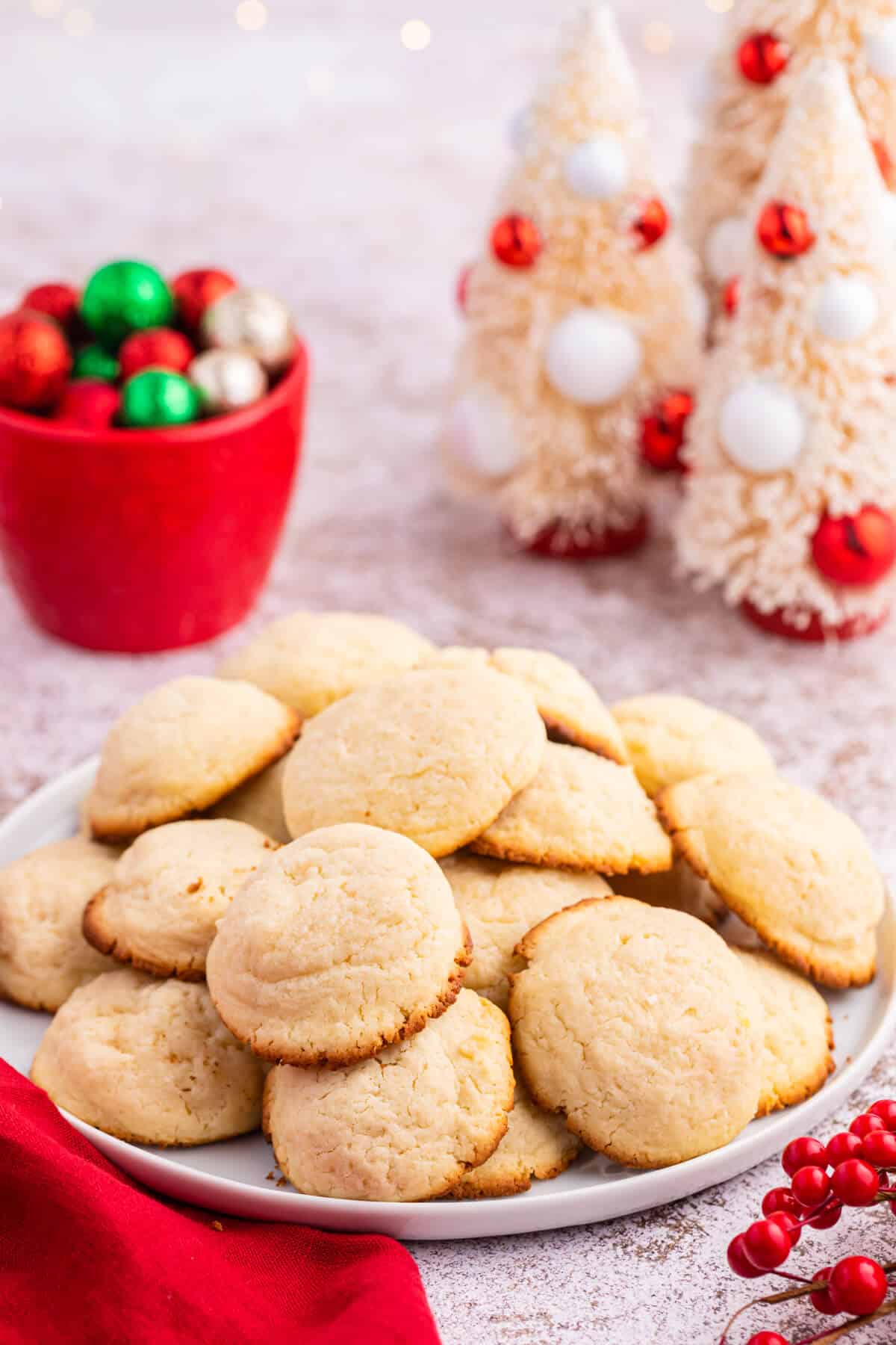 Cream cheese cookies on a plate.