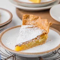 A slice of chess pie on a plate.