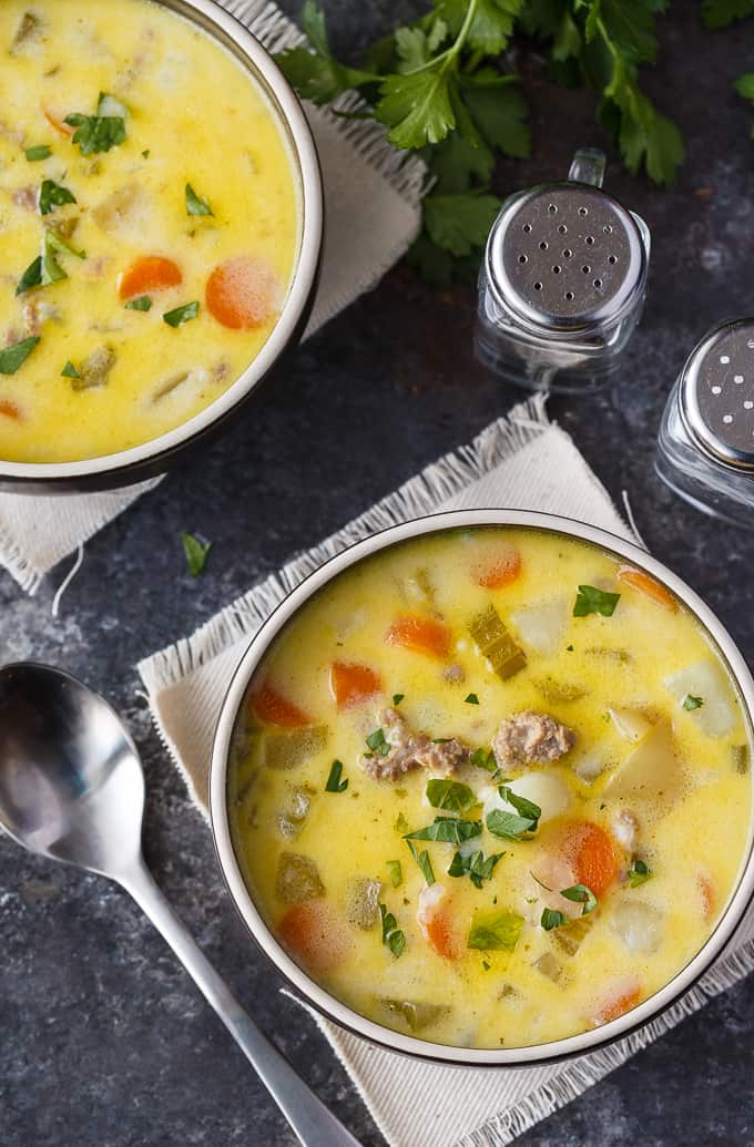 Cheeseburger Chowder - The best comfort food to warm your bones! This creamy, cheesy soup is filled with ground beef, potatoes, carrots, celery, and Velveeta cheese.