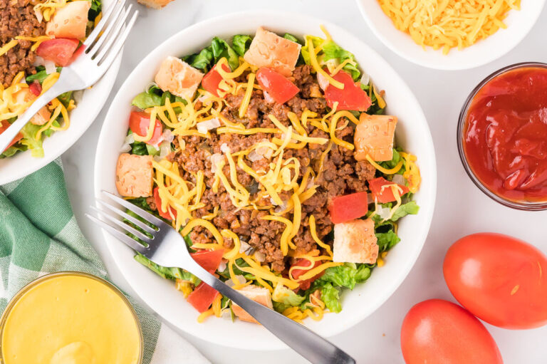A bowl of Cheeseburger Salad with a fork.
