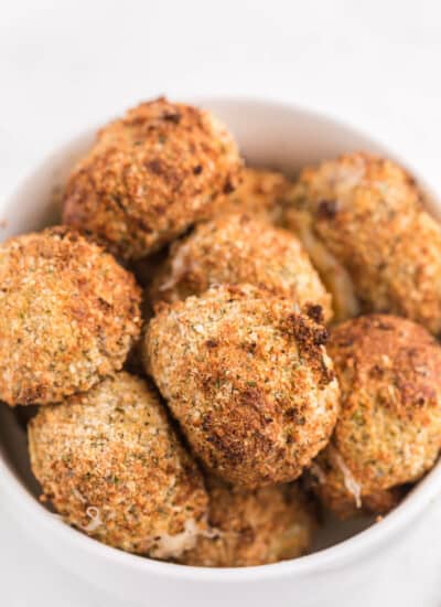 Air Fryer Mozzarella Balls - These homemade cheeseballs are bite sized, super seasoned, and air fried in minutes! A great make-ahead snack or appetizer.