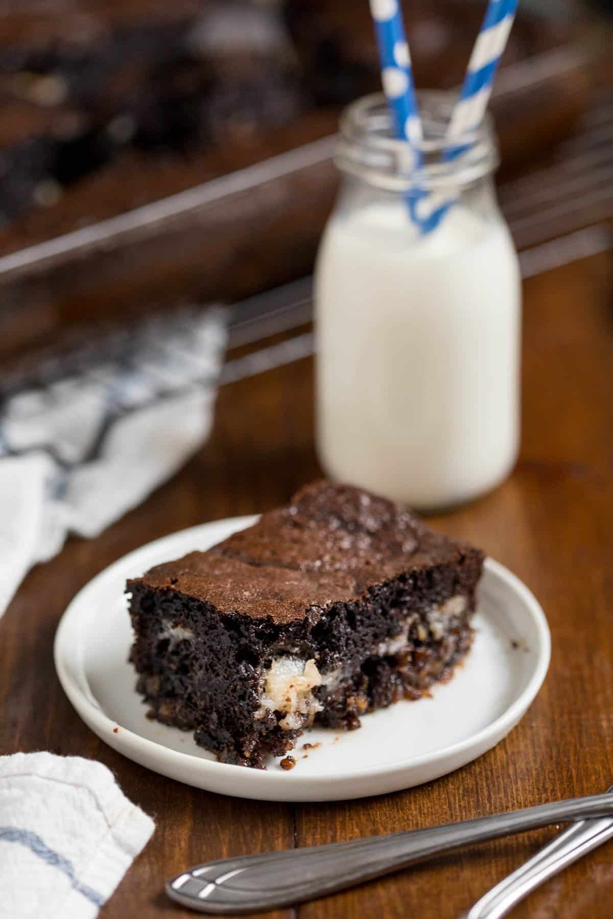 A piece of earthquake cake on a plate.