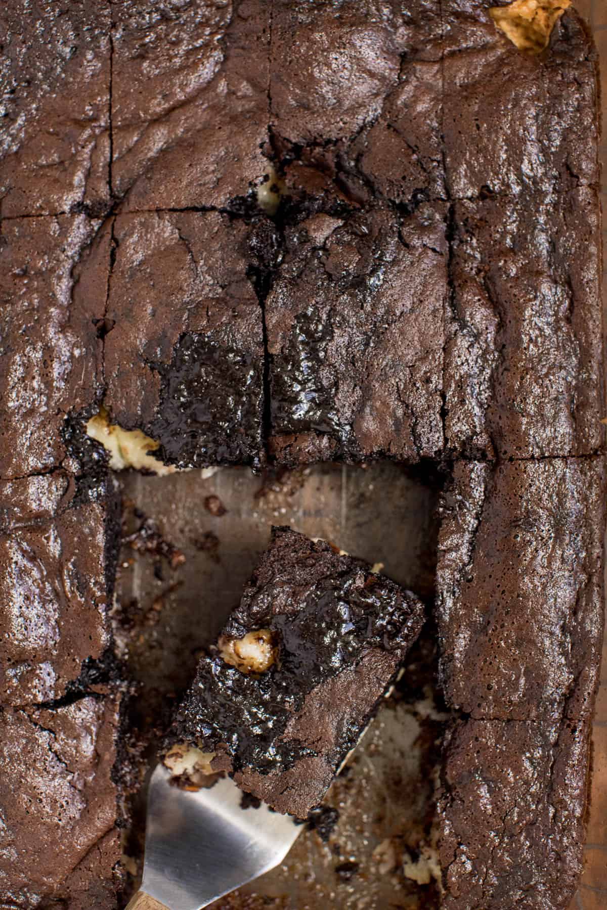 Earthquake Cake - A sweet chocolate cake mixed with condensed milk for an earth-moving dessert! Perfect for a family dinner or potluck.