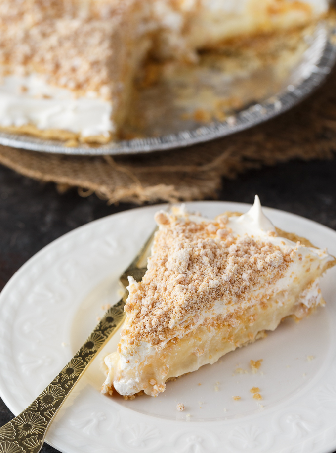 Peanut Butter Pie - Layers of sweet deliciousness! The bottom layer is smooth, sweet peanut butter crumbs followed by a vanilla pudding. The pie is finished off with another layer of peanut butter crumbs for an out of this world dessert.