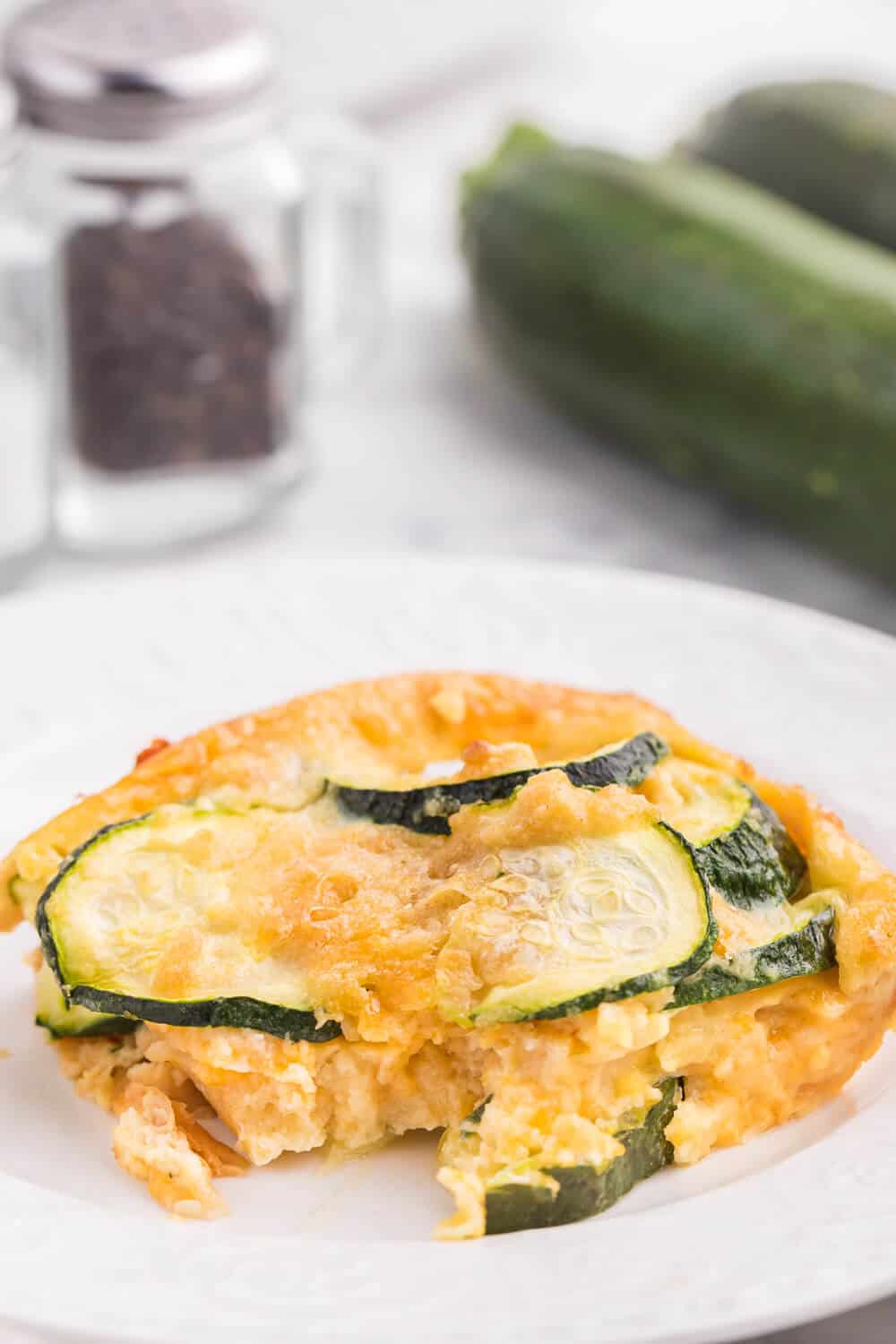 Baked Zucchini - An egg-based casserole with roasted zucchini slices, buttery crushed Ritz crackers and loads of cheese.