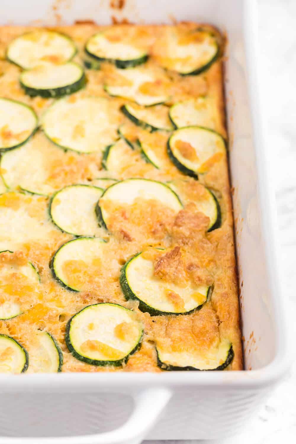 Baked Zucchini - An egg-based casserole with roasted zucchini slices, buttery crushed Ritz crackers and loads of cheese.