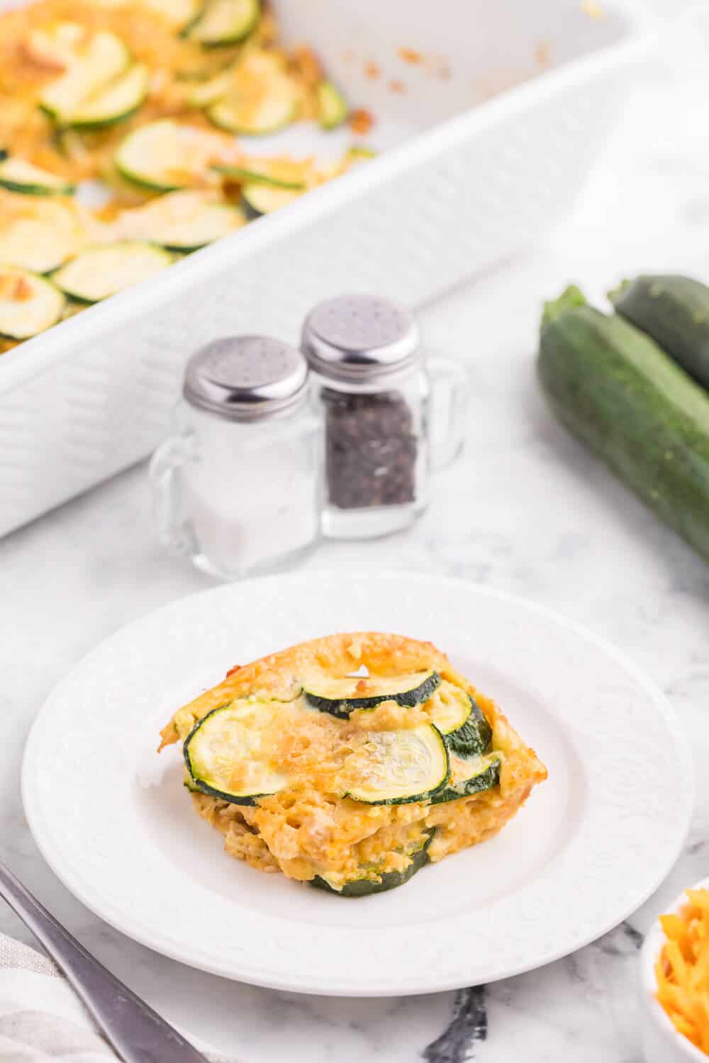 Baked Zucchini - An egg-based casserole with roasted zucchini slices, buttery crushed Ritz crackers and loads of cheese.