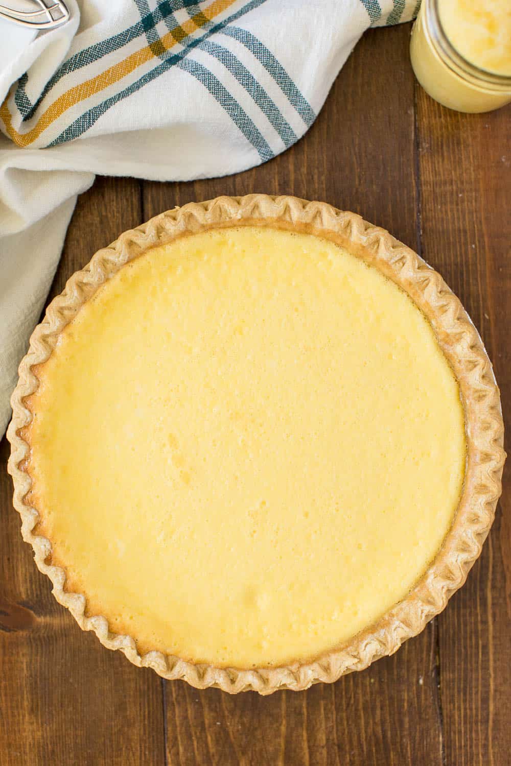 Pineapple Pie - A creamy, tropical pie with a twist. This easy dessert is filled with cream cheese, vanilla, and pineapple chunks!