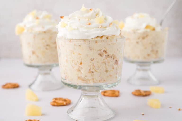 Pineapple pretzel fluffs in parfait dishes.