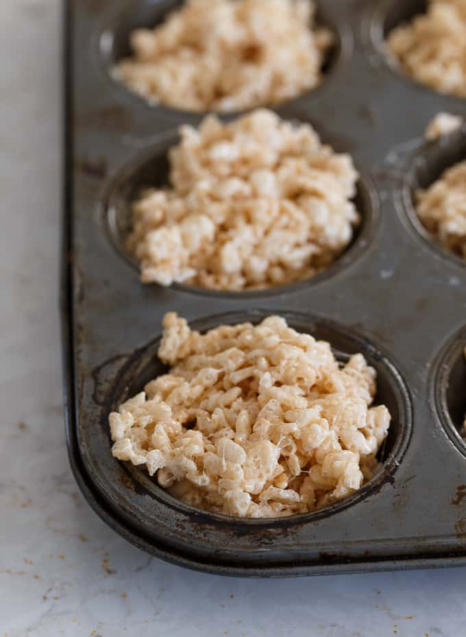 Krispie Easter Nests - This easy Easter dessert is fun to make and eat! Kids love to help decorate with colourful green grass and Easter chocolate and candy.