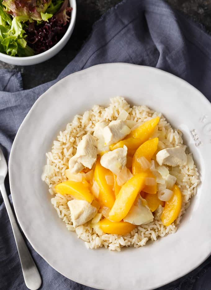 Peach Chicken - An easy dinner with cubed chicken breasts and sliced peaches. Perfectly sweet and delicious!