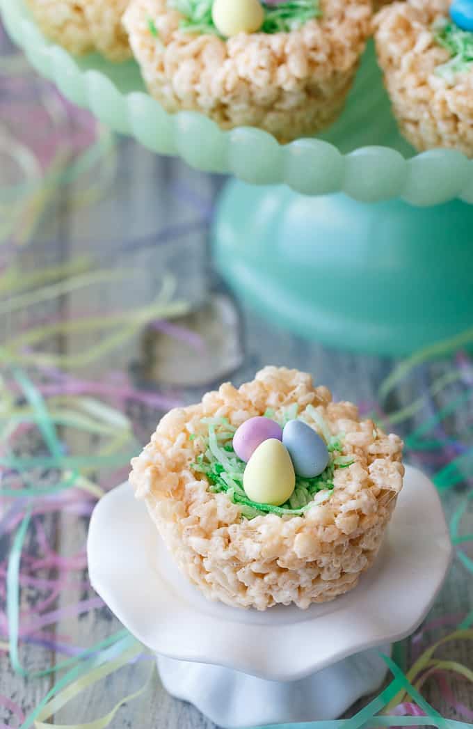 Krispie Easter Nests - This easy Easter dessert is fun to make and eat! Kids love to help decorate with colourful green grass and Easter chocolate and candy.