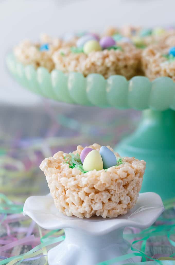Krispie Easter Nests - This easy Easter dessert is fun to make and eat! Kids love to help decorate with colourful green grass and Easter chocolate and candy.
