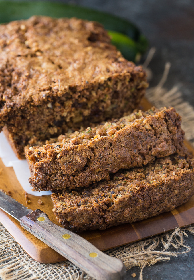 Zucchini Bread - A moist and delicious zucchini loaf for all the veggie haters! This sweet bread is filled with zucchini, raisins, walnuts, and cinnamon. It's my grandma's recipe.