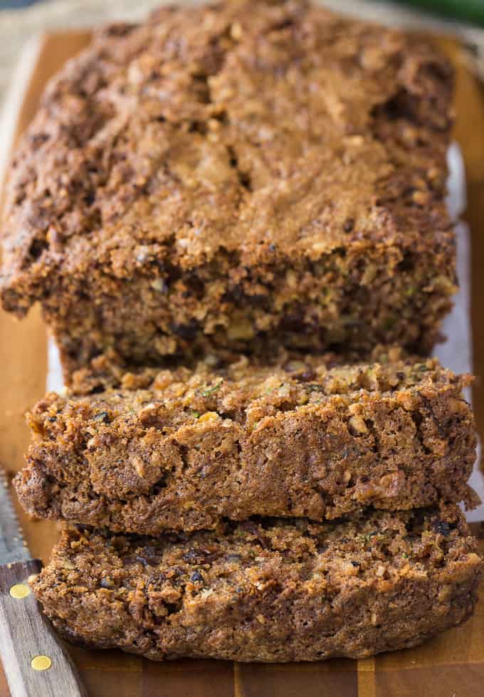 Zucchini Bread - A moist and delicious zucchini loaf for all the veggie haters! This sweet bread is filled with zucchini, raisins, walnuts, and cinnamon. It's my grandma's recipe.