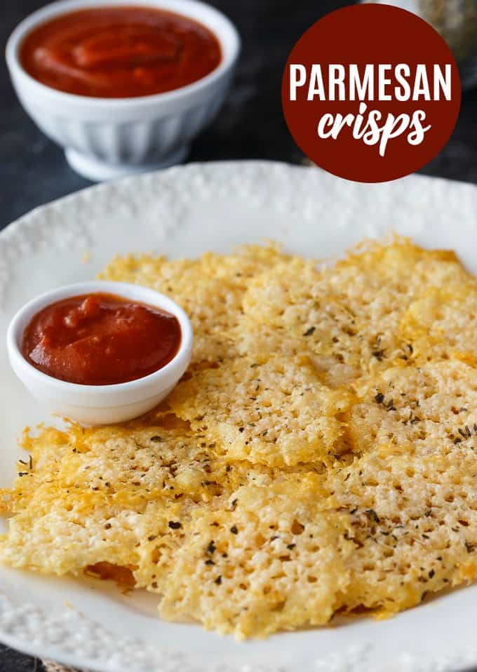 Parmesan Crisps - The perfect low carb snack! This easy recipe is guilt-free and delicious. Enjoy as an appetizer, in soup or salads or even as the bread for your sandwich.