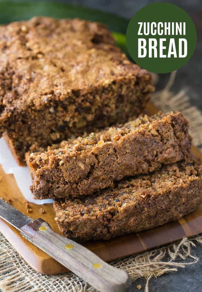 Zucchini Bread - A moist and delicious zucchini loaf for all the veggie haters! This sweet bread is filled with zucchini, raisins, walnuts, and cinnamon. It's my grandma's recipe.