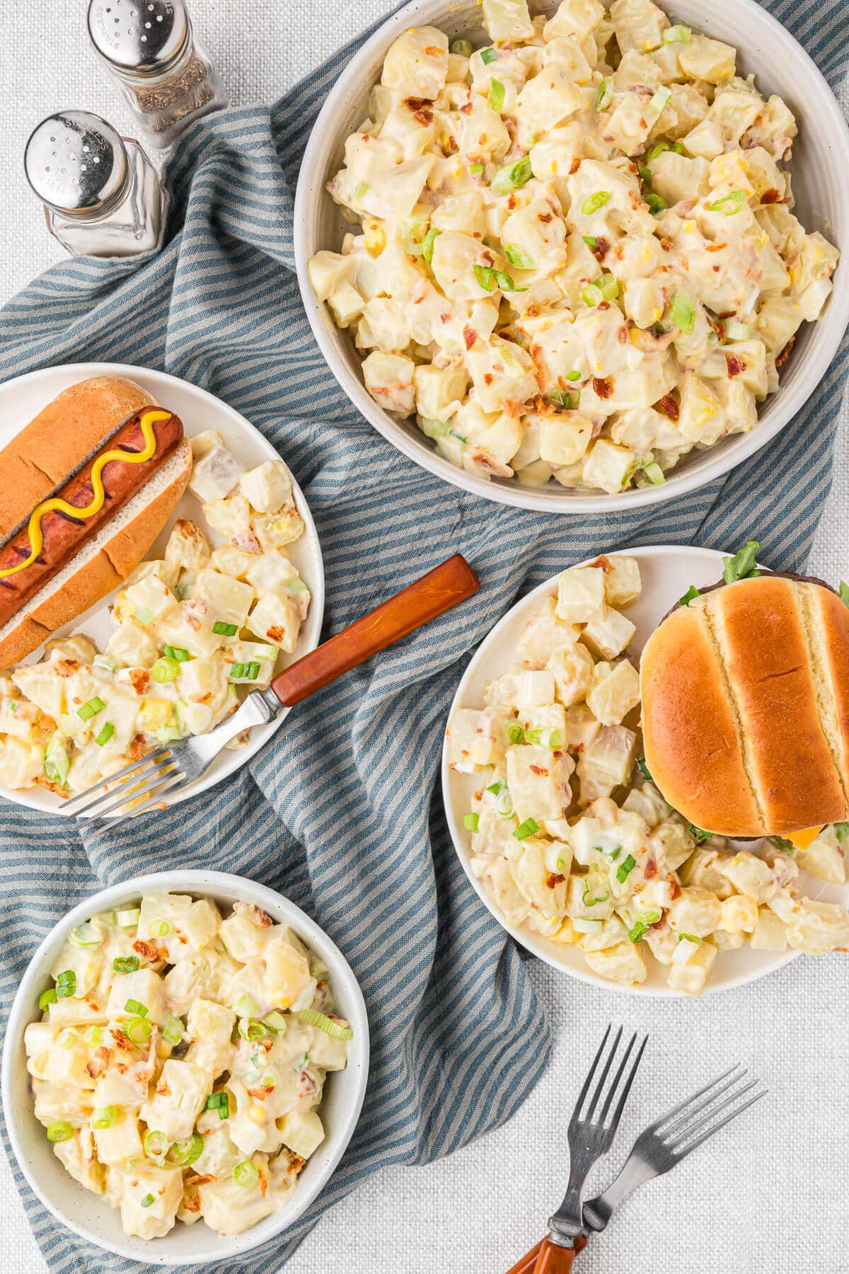 Dutch potato salad bowls with hamburgers and hotdogs.