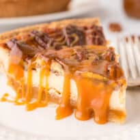 A slice of cheesecake on a plate.