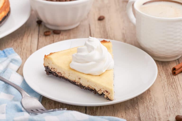 A slice of cappuccino cheesecake on a plate.