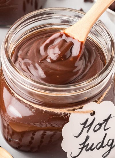 A jar of the recipe with a wooden spoon.