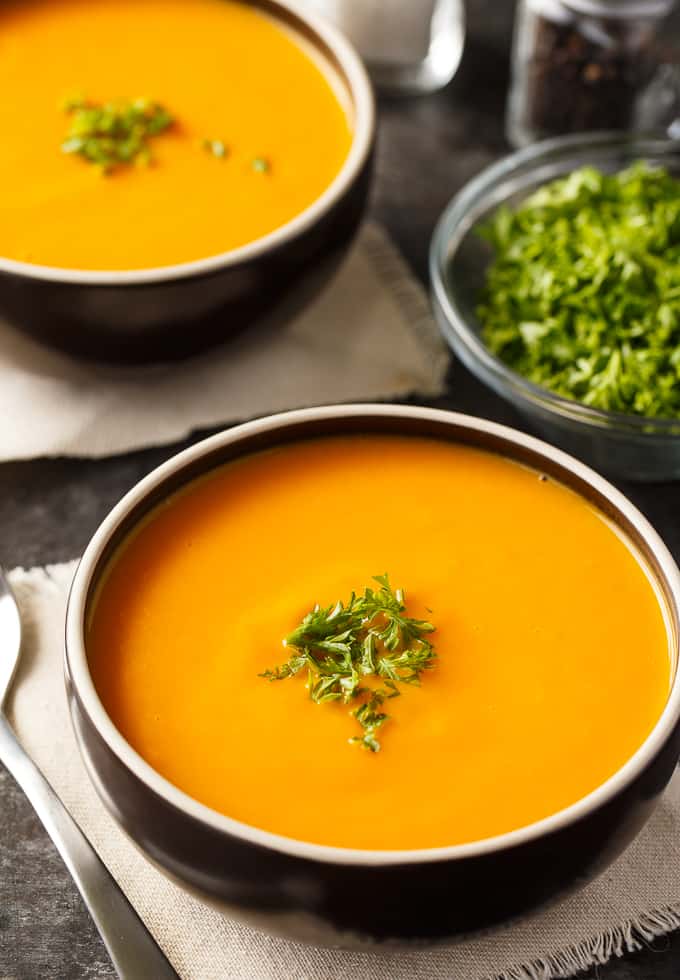 Cream of Carrot Soup - This creamy bisque recipe screams fall! This smooth, velvety soup with potatoes, celery, onions, and a little milk is so decadent, but super easy, too. Perfect for dinner parties!