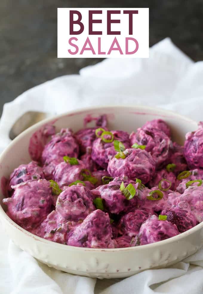 Beet Salad - The most beautiful vegetable salad! These pickled beets and green onions are surrounded by a creamy horseradish dressing and dill for an amazing side dish.