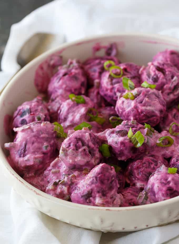 Beet Salad - The most beautiful vegetable salad! These pickled beets and green onions are surrounded by a creamy horseradish dressing and dill for an amazing side dish.