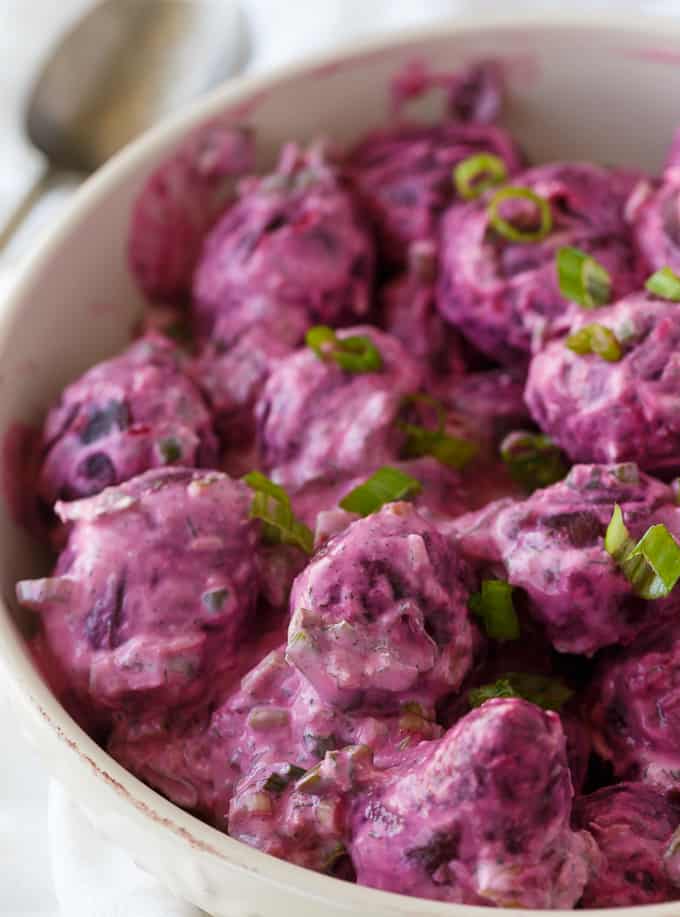 Beet Salad - The most beautiful vegetable salad! These pickled beets and green onions are surrounded by a creamy horseradish dressing and dill for an amazing side dish.