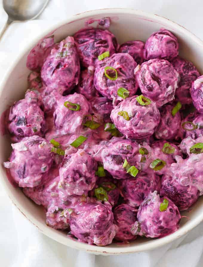 Beet Salad - The most beautiful vegetable salad! These pickled beets and green onions are surrounded by a creamy horseradish dressing and dill for an amazing side dish.