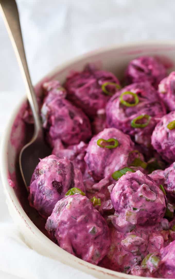 Beet Salad - The most beautiful vegetable salad! These pickled beets and green onions are surrounded by a creamy horseradish dressing and dill for an amazing side dish.