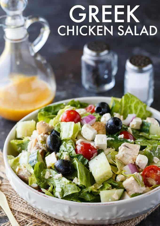 Greek Chicken Salad - This delicious salad is a meal on its own! It's loaded with chicken, fresh veggies, black olives, feta cheese and a Greek vinaigrette.