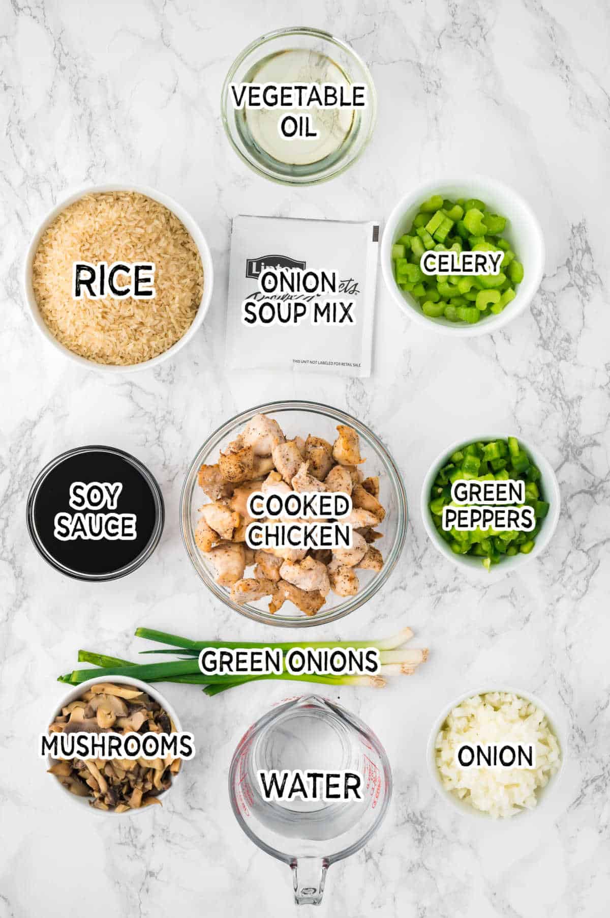 Ingredients to make oven baked chicken fried rice.