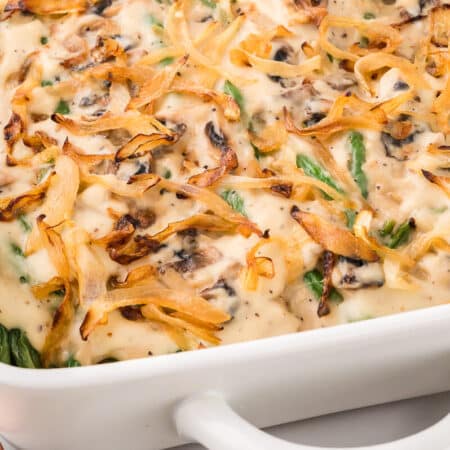 Green bean casserole in white pan.