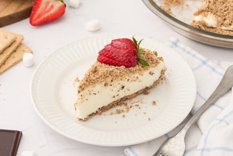A slice of pie on a plate.