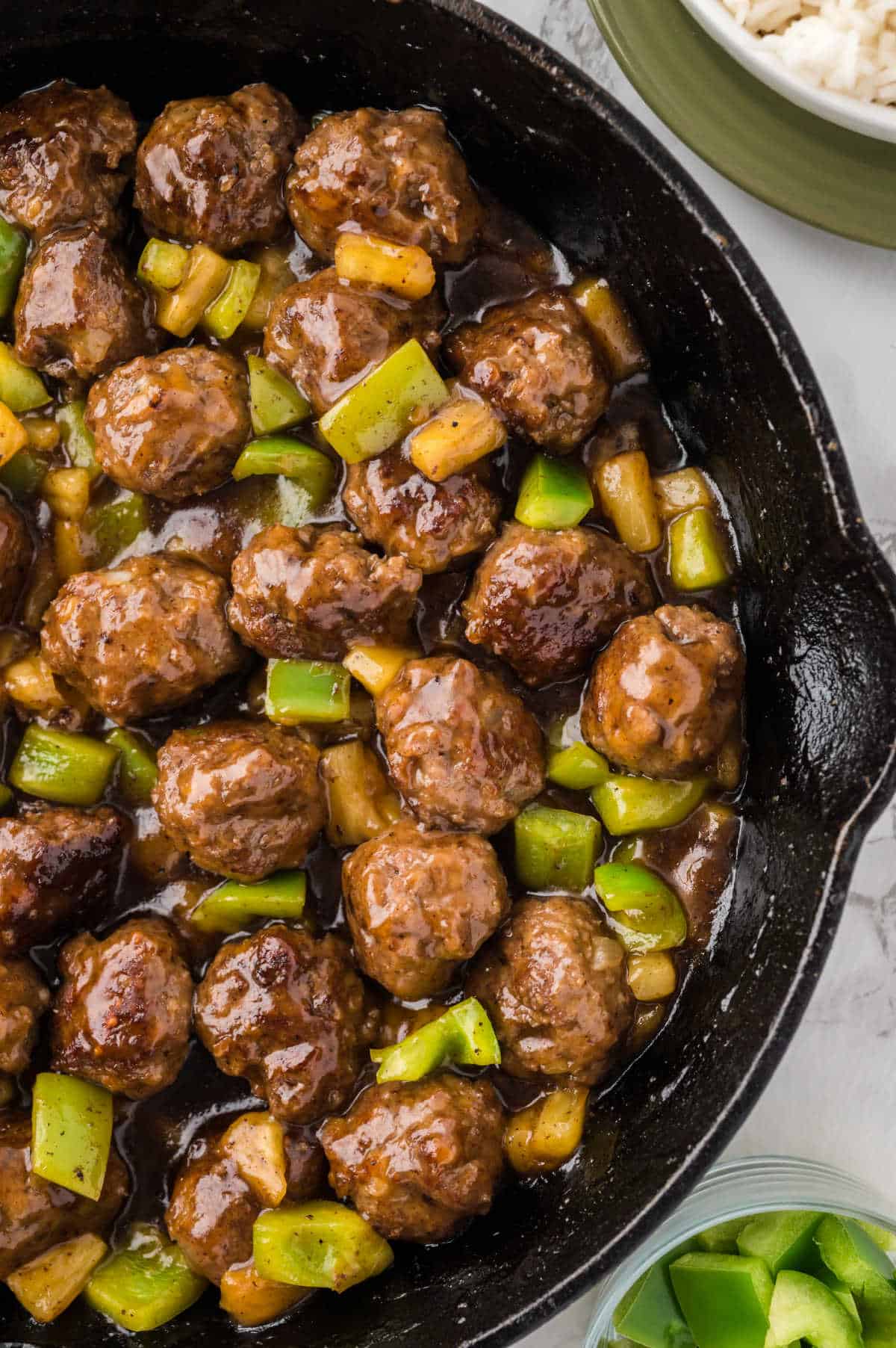 Waikiki meatballs in a skillet.