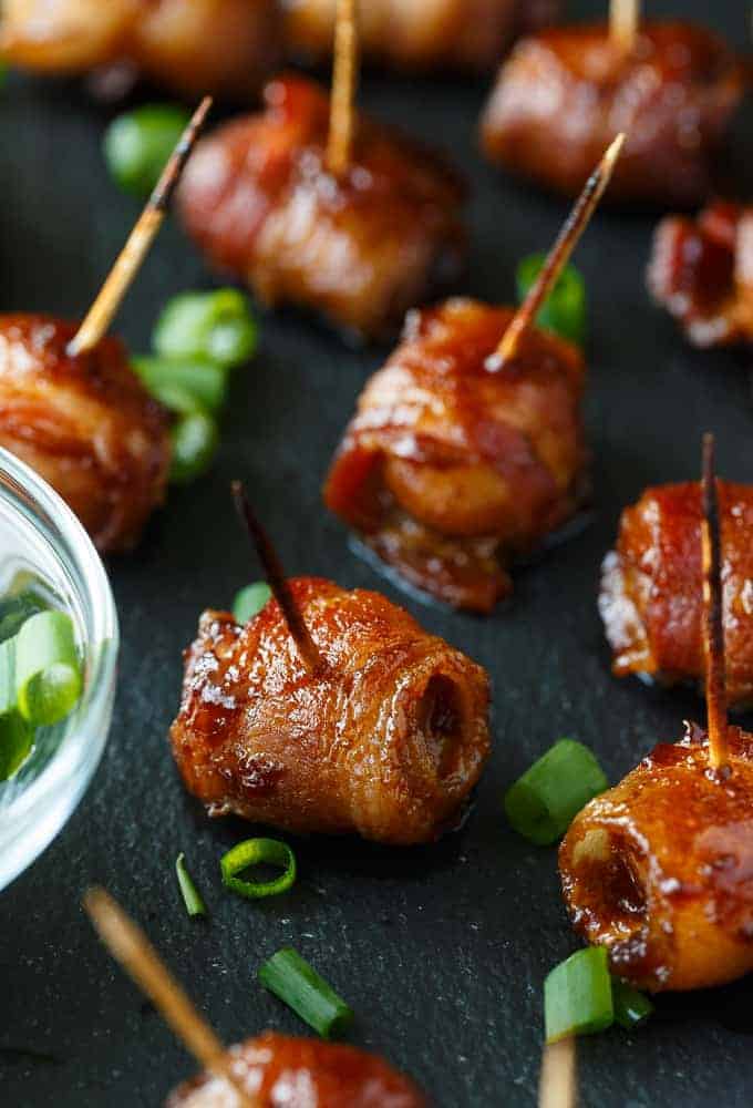 Bacon-Wrapped Water Chestnuts - Everyone goes NUTS over this easy appetizer. Whole water chestnuts are wrapped in bacon and marinated in a sweet/savory sauce.