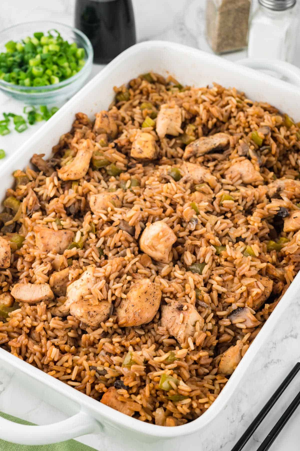 Chicken fried rice in a casserole dish.