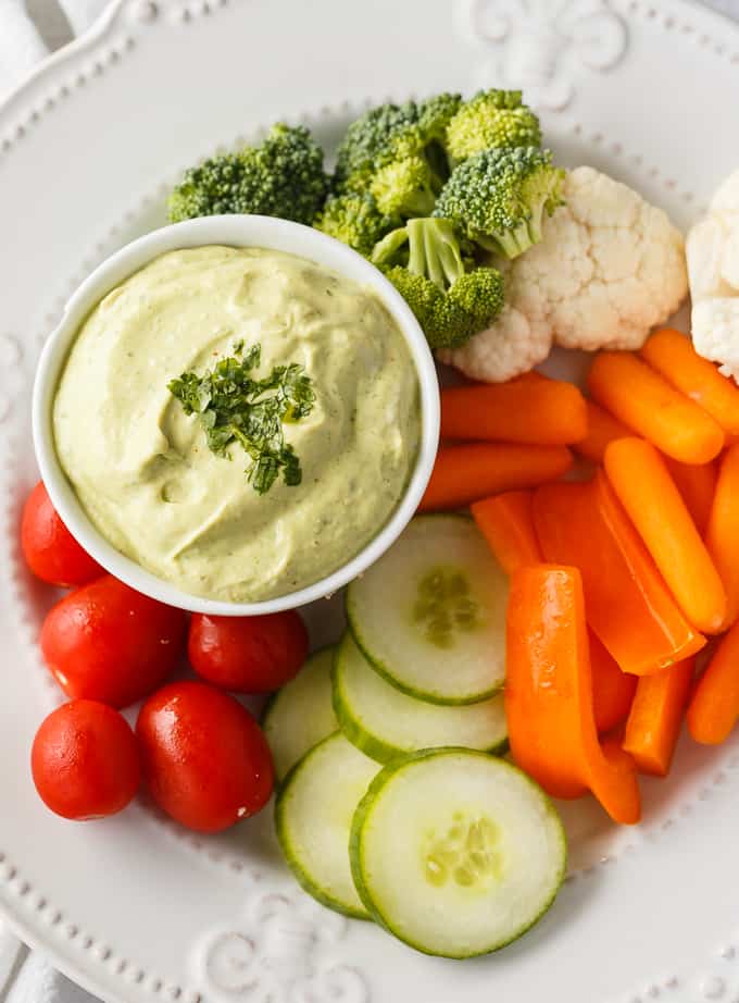 Cilantro Lime Avocado Yogurt Dip - This healthy veggie dip is as creamy as it is delicious! Packed with lime juice, Greek yogurt, avocado, cilantro, and a touch of chili powder.