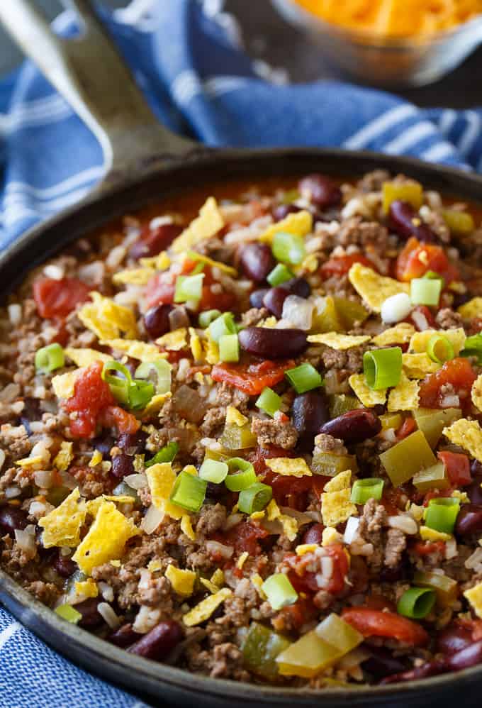 Texas Beef Skillet - An easy meal made in one pan! It's hearty and filling with the flavors of chili and rice.